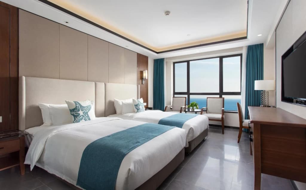 Sanya New City Hotel - Санья